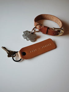 "Dogs > People" Keychain